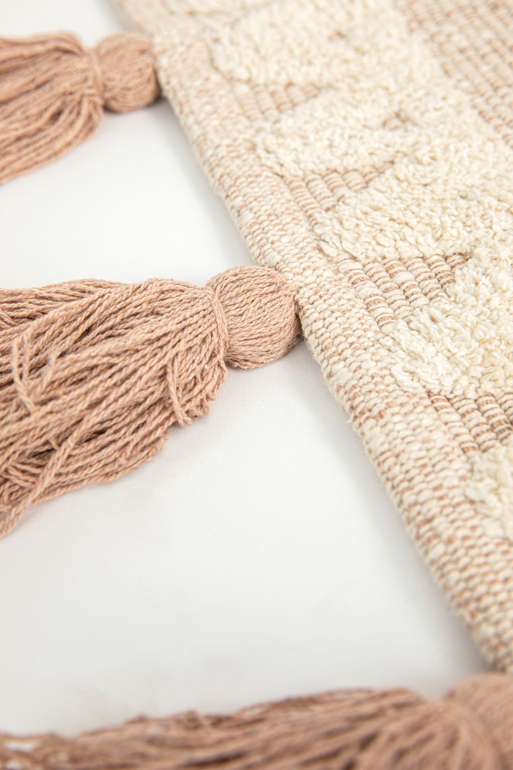 Beige badmat met geometrische figuren