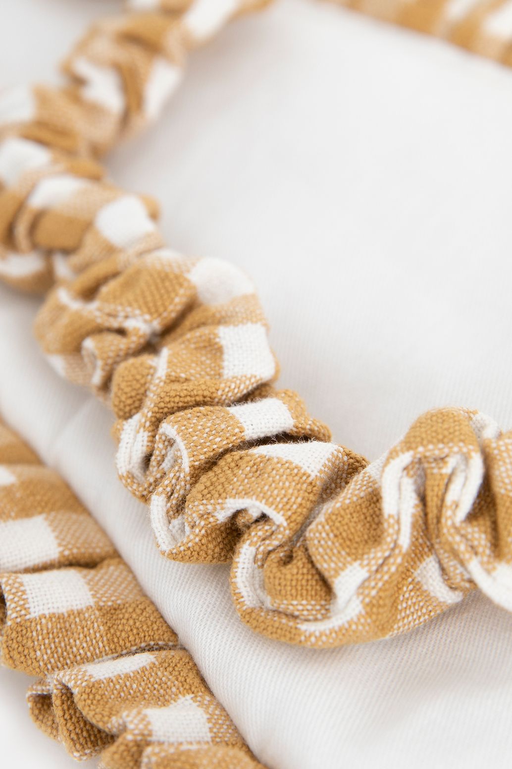 Donkergeel geblokt oogmasker