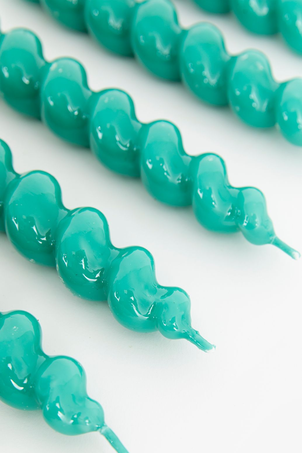 Turquoise draaikaarsen 16cm