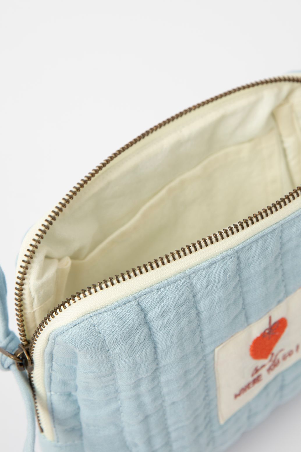 Kosmetiktasche mit Aufschrift - hellblau