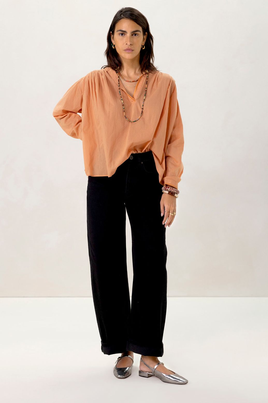 Oranje blouse met plooiing