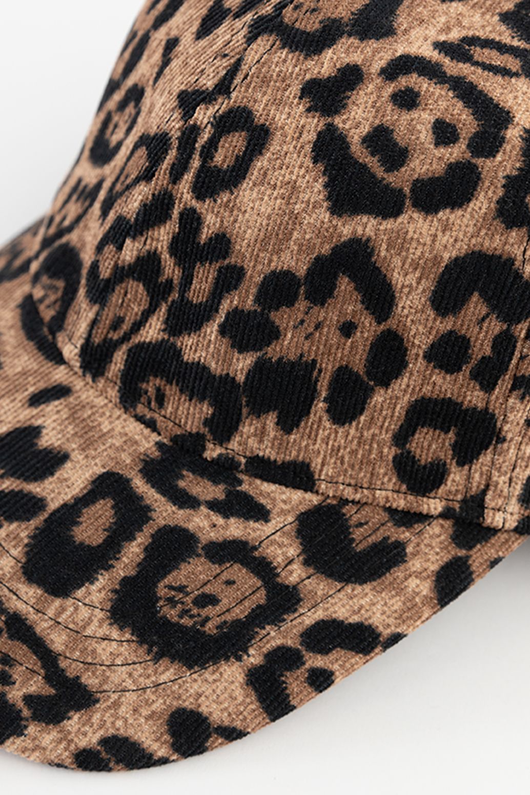 Cord-Kappe mit Leoprint - braun