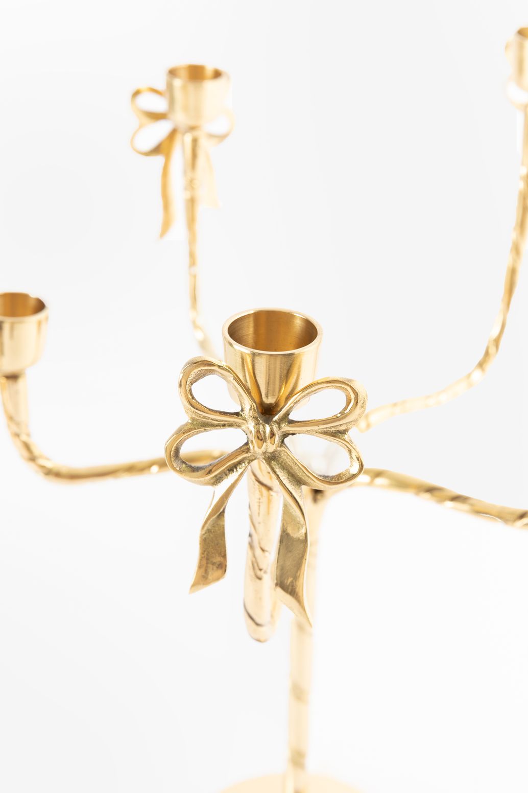 Goudkleurige kandelaar met strikjes