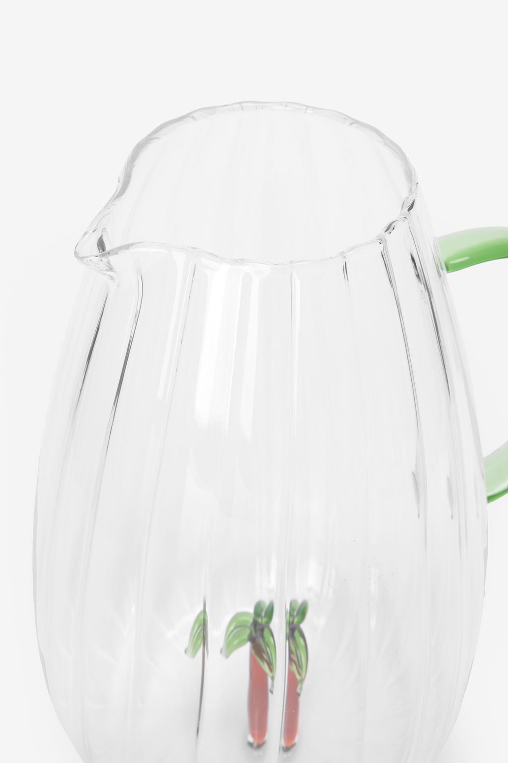 Glaskaraffe mit Palme