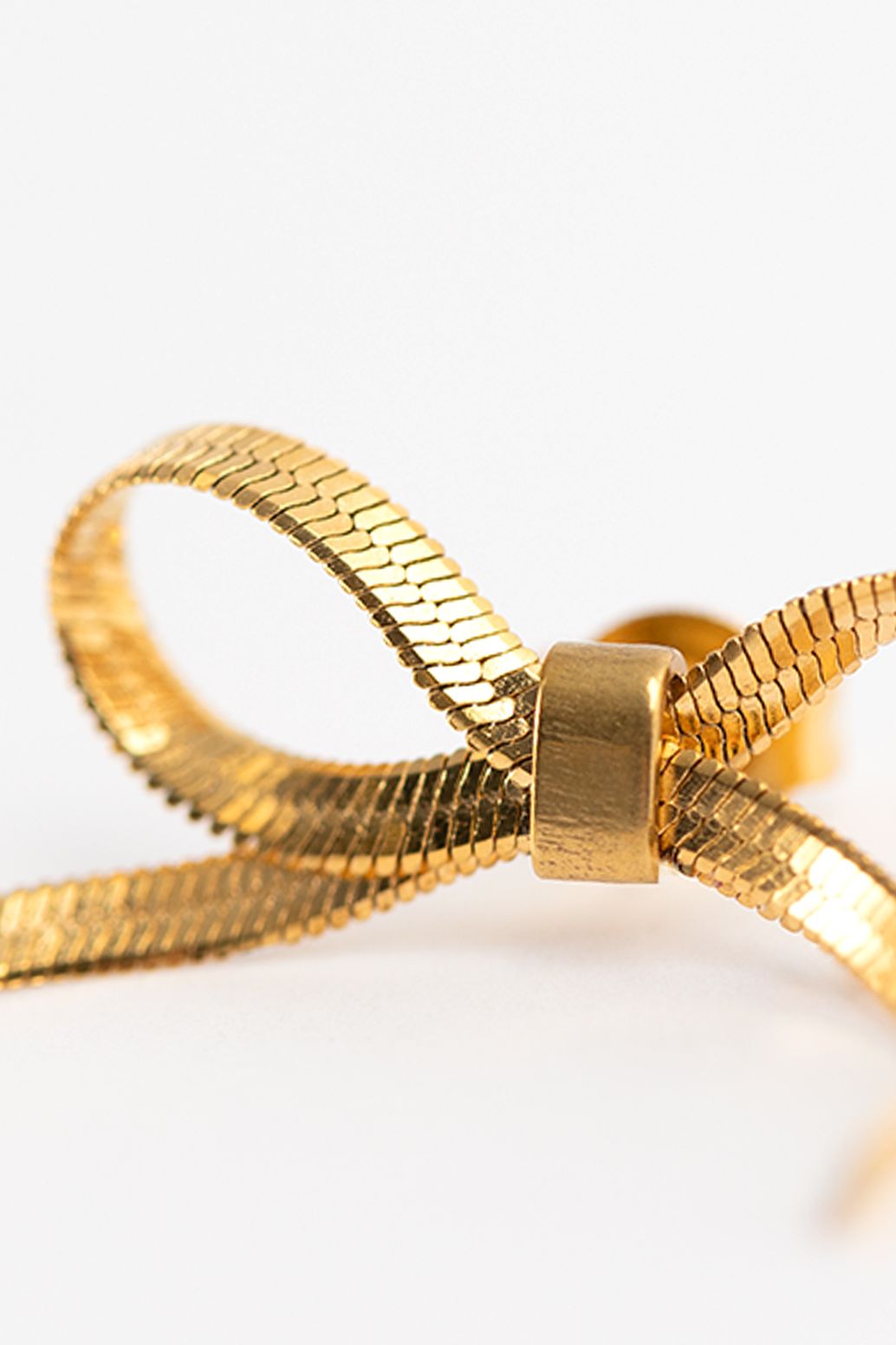 Gold plated stud oorbellen met strikjes