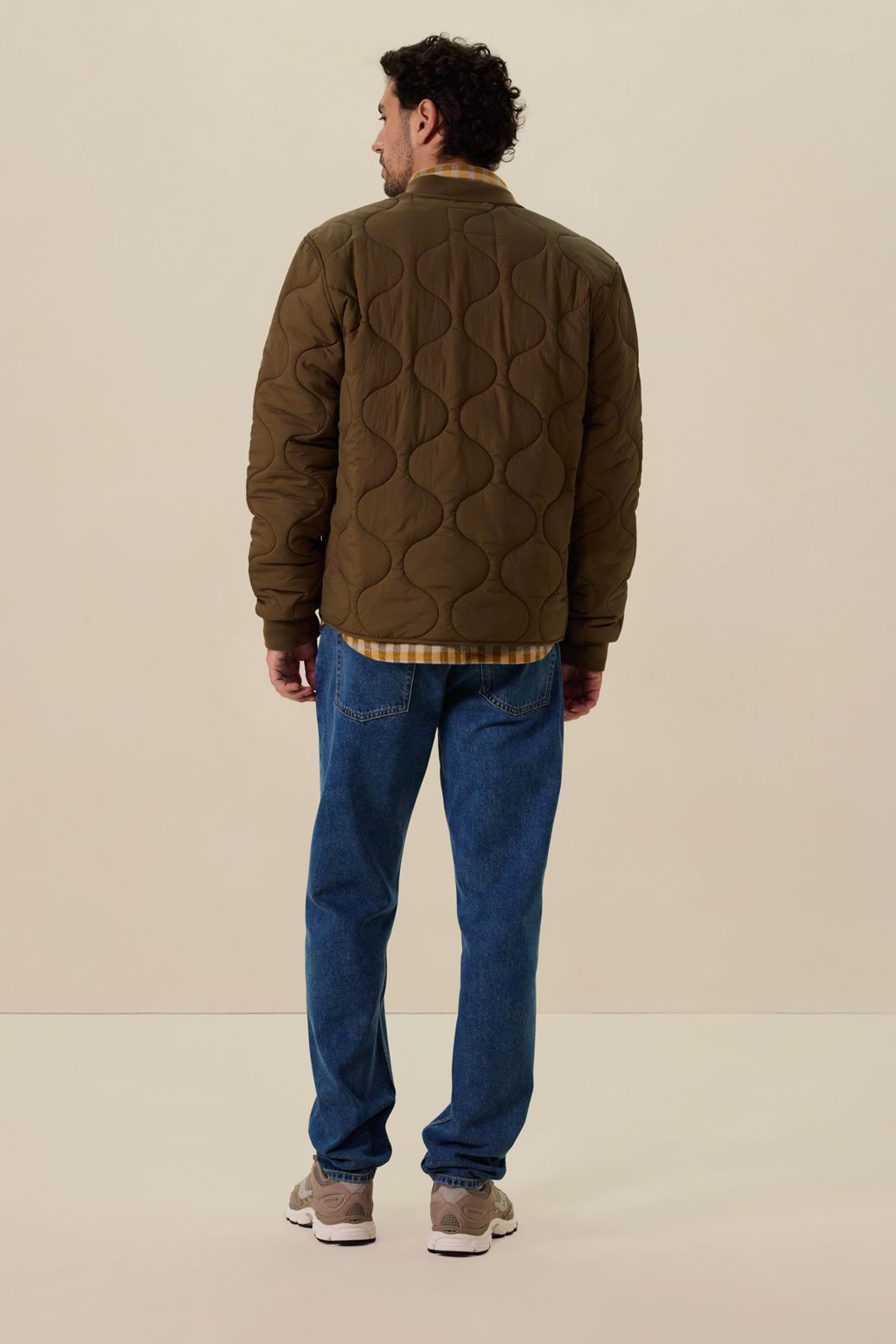 Donkergroene quilted jas