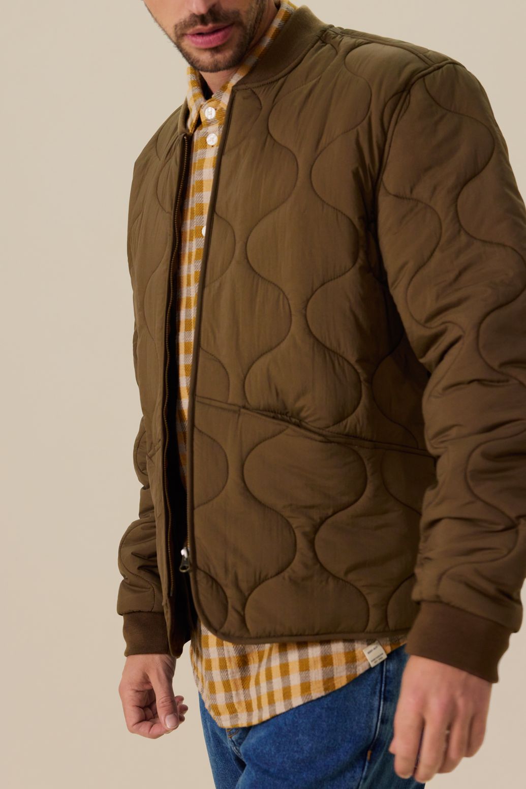 Donkergroene quilted jas