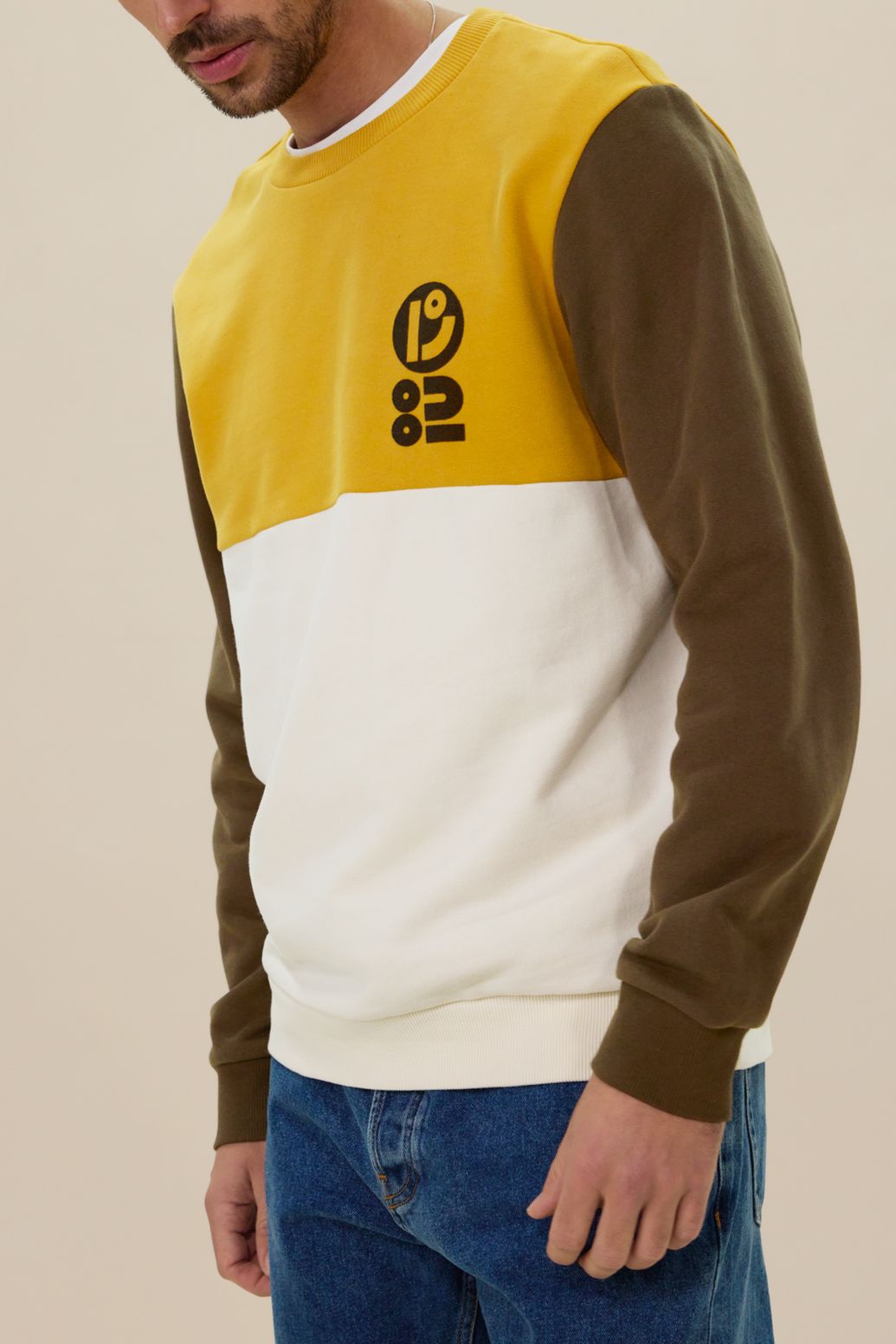 Donkergroene colourblock sweater met artwork