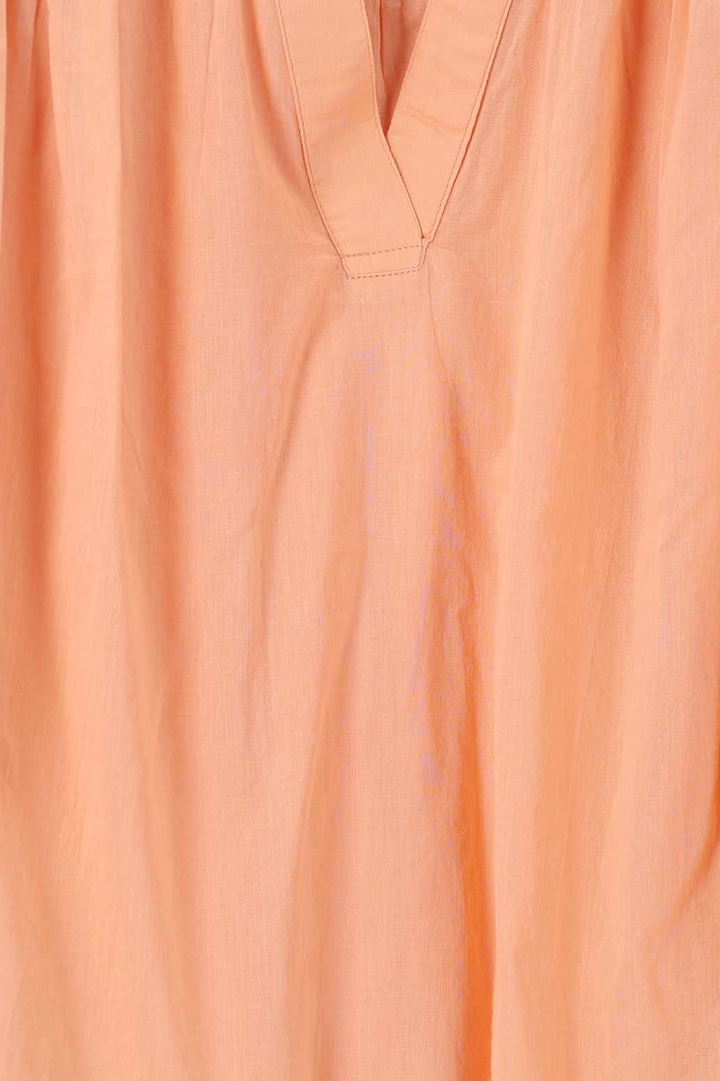 Lichtoranje top met pintuck details