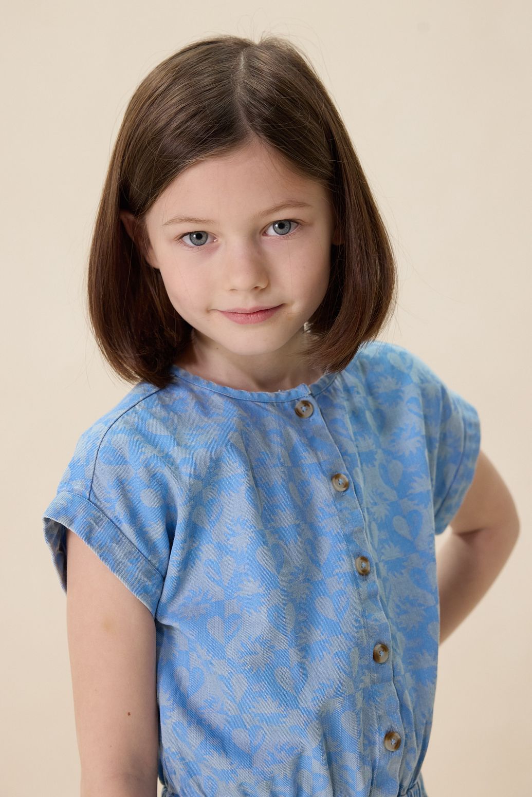 Blauwe denim jumpsuit met print