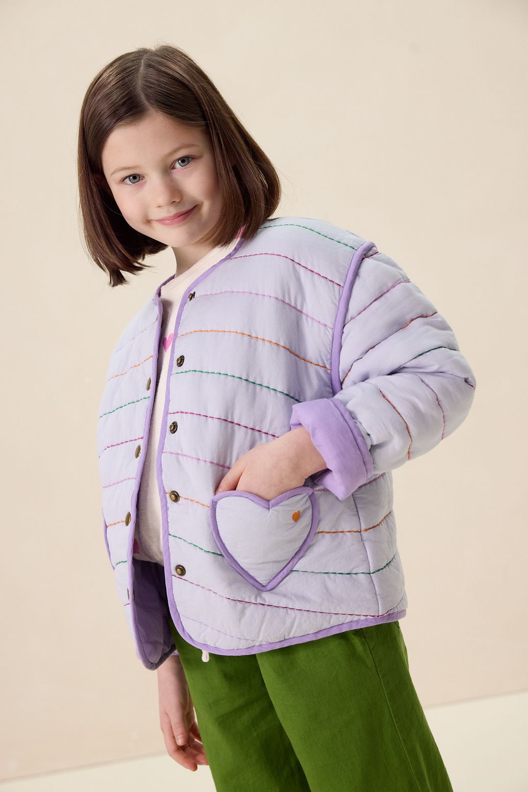 Lichtpaarse padded jack met opgestikte zakken
