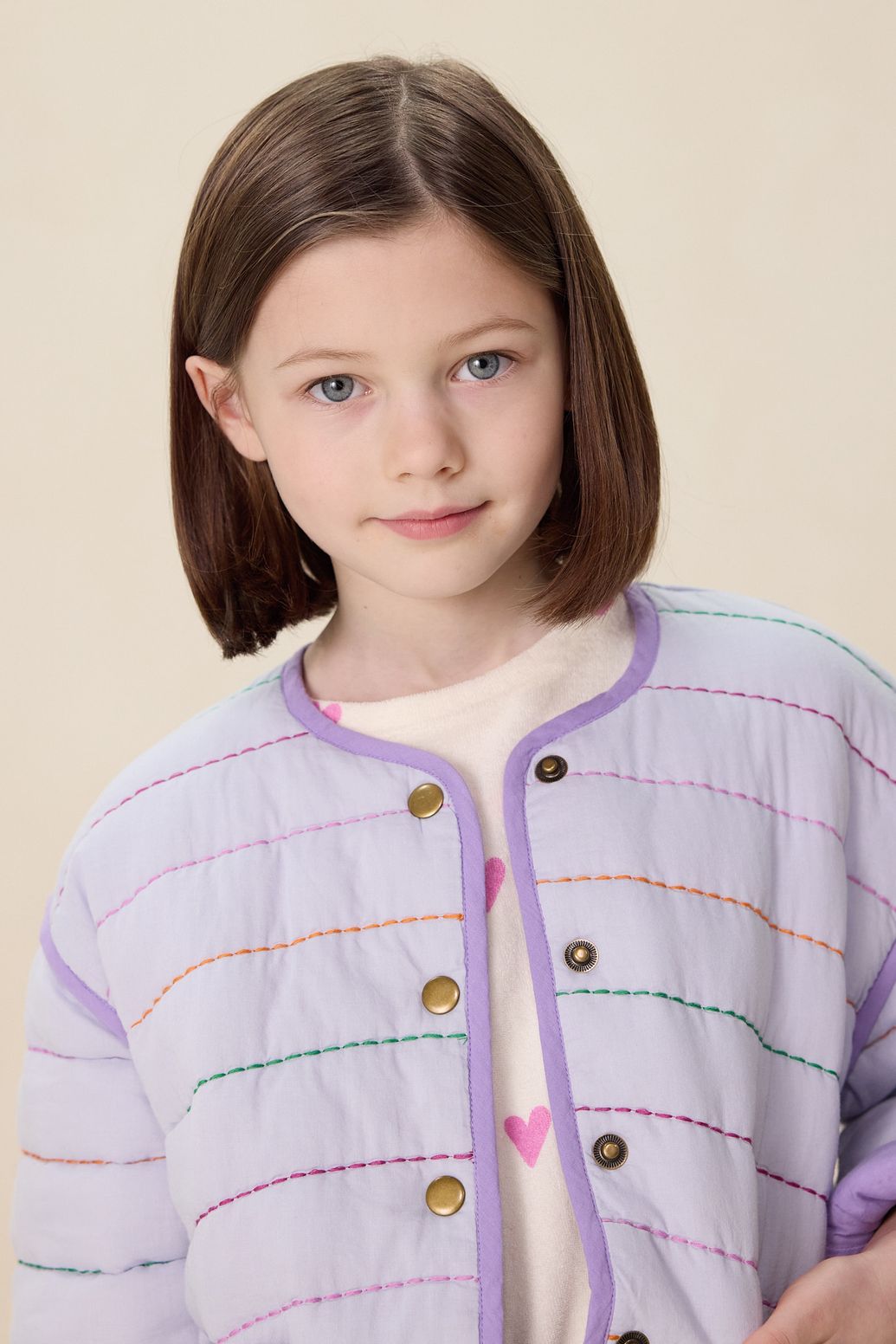 Lichtpaarse padded jack met opgestikte zakken
