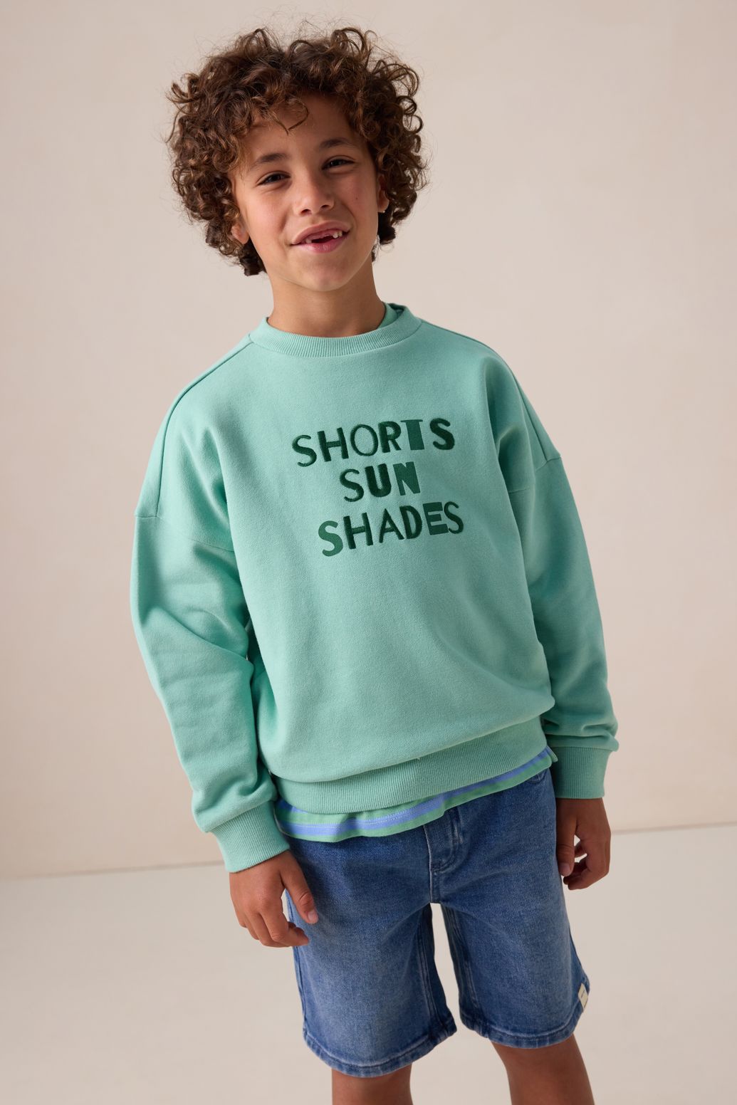 Groene sweater met artwork