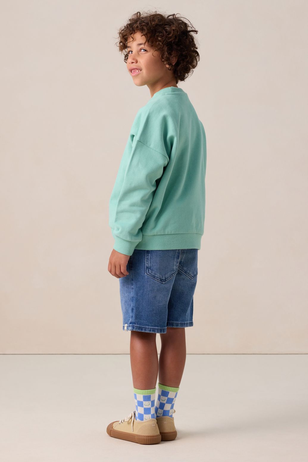 Groene sweater met artwork