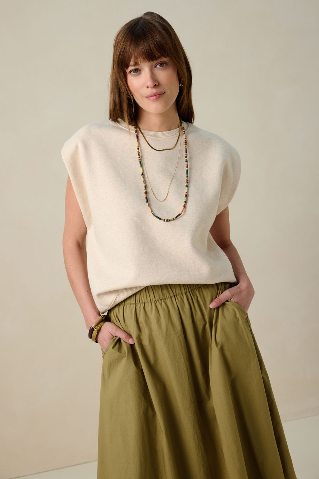 Beige mouwloze sweater