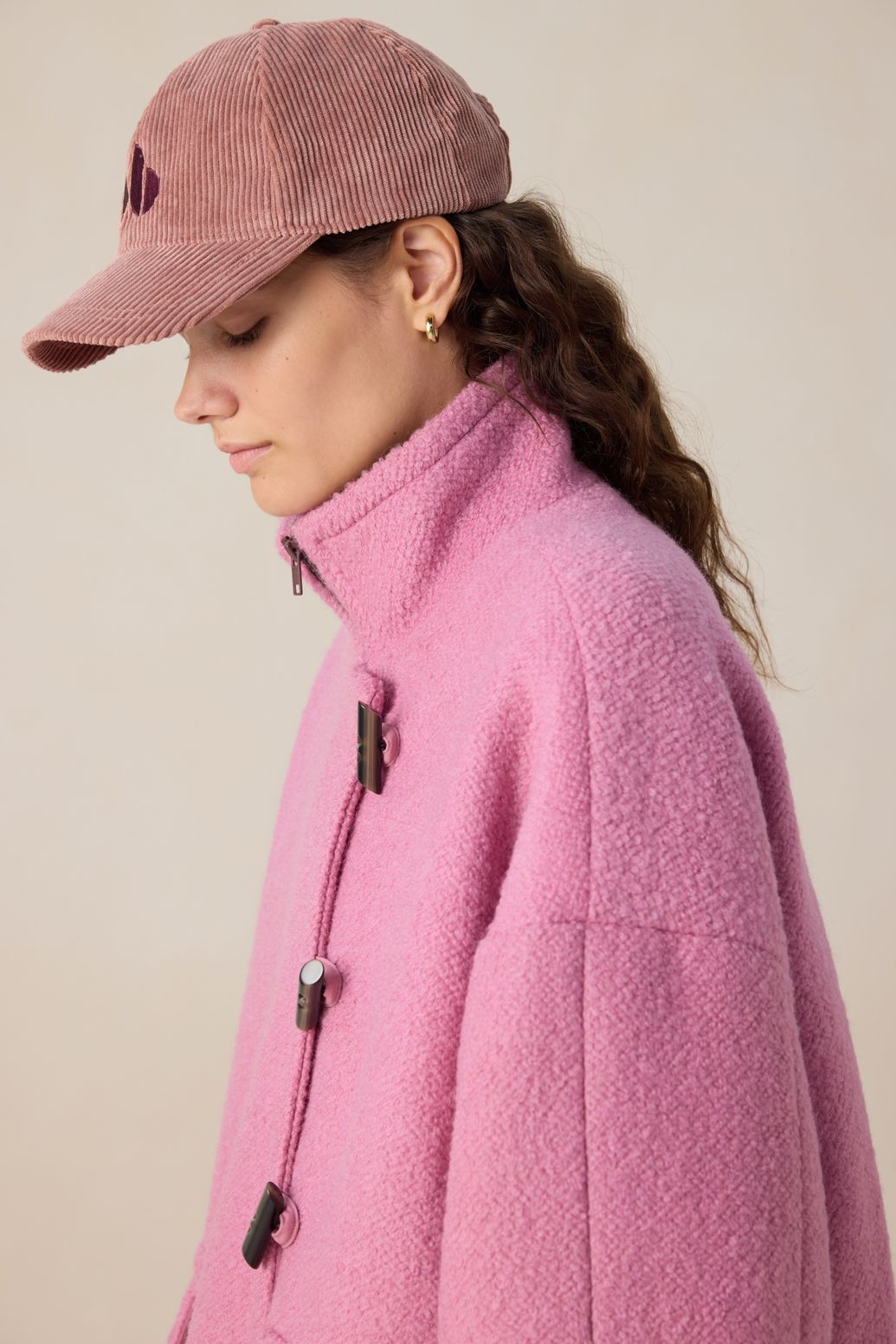 Roze wollen boucle jas