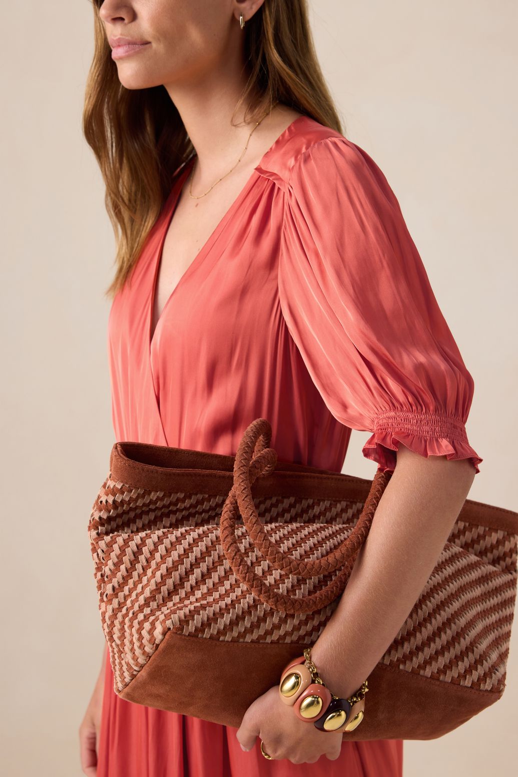 Lichtoranje gevlochten suède tas