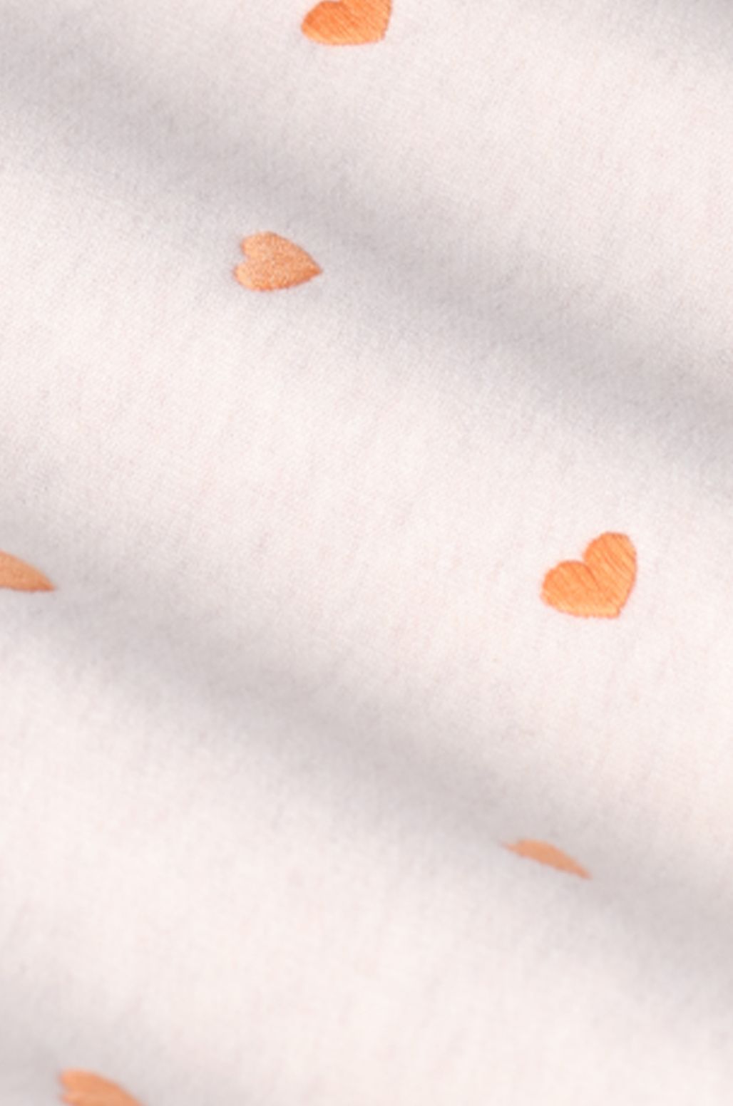 Beige sweater met hartjes