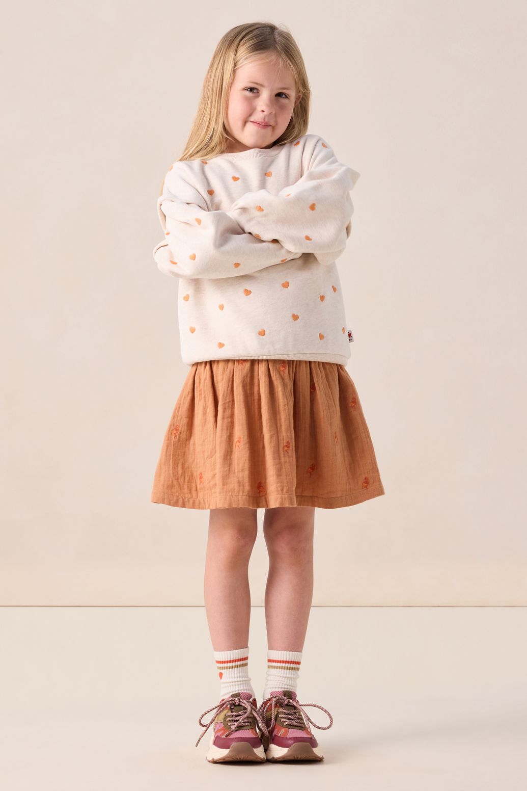 Beige sweater met hartjes