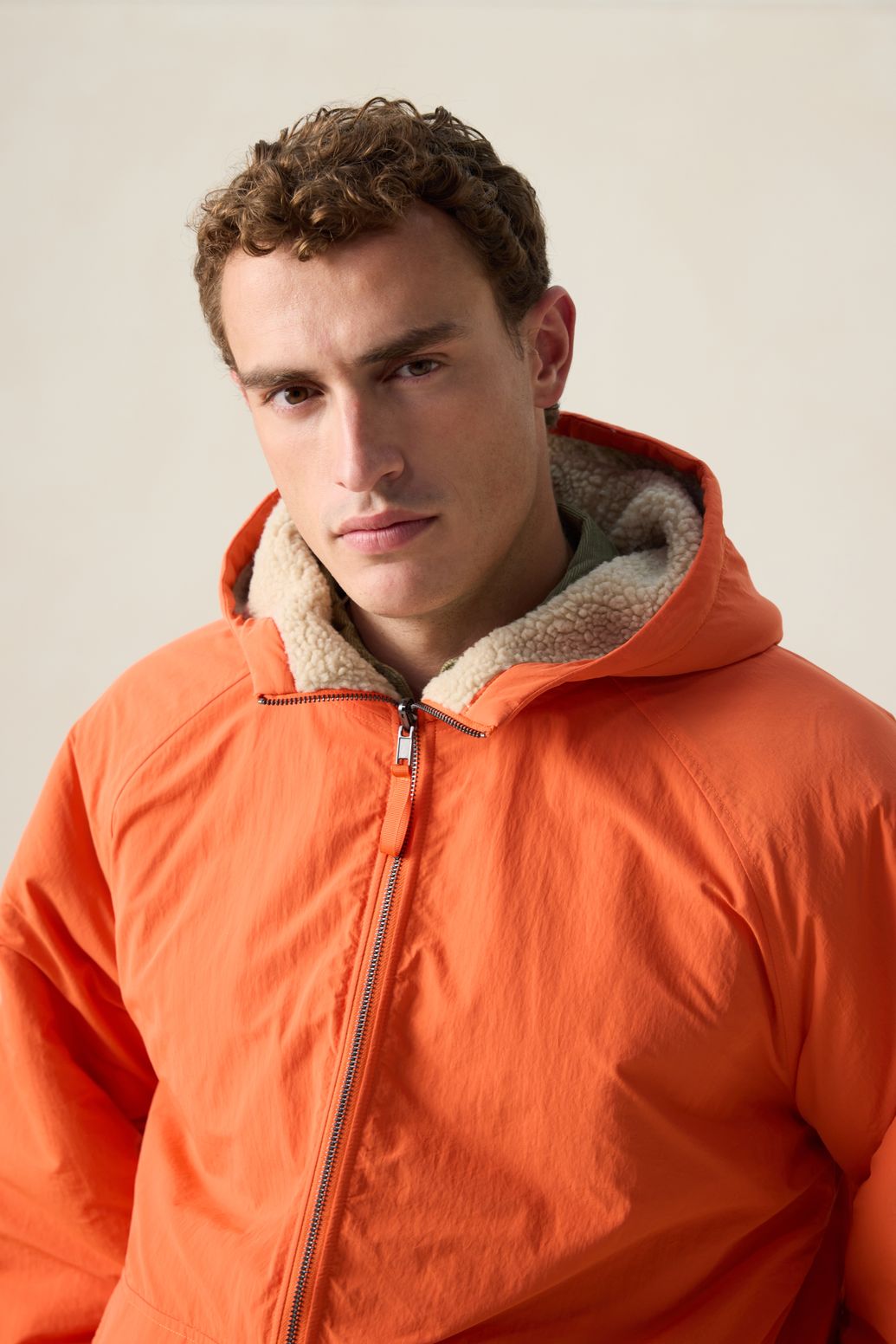 Oranje reversible teddy jas