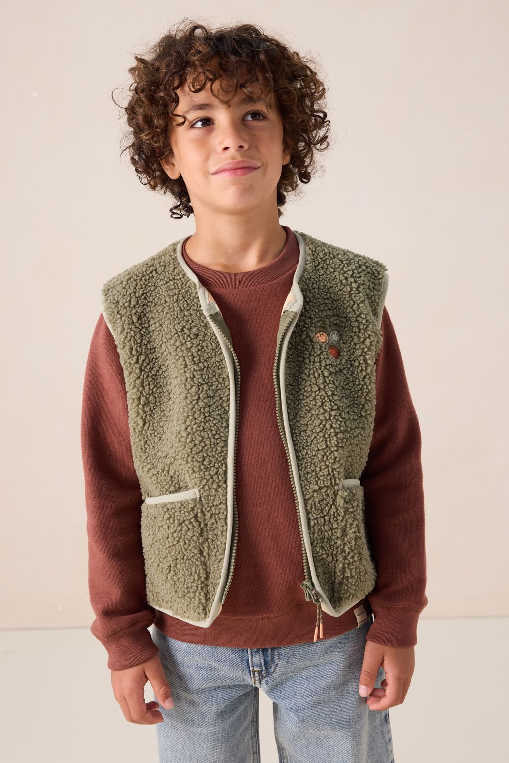 Donkergroen teddy gilet