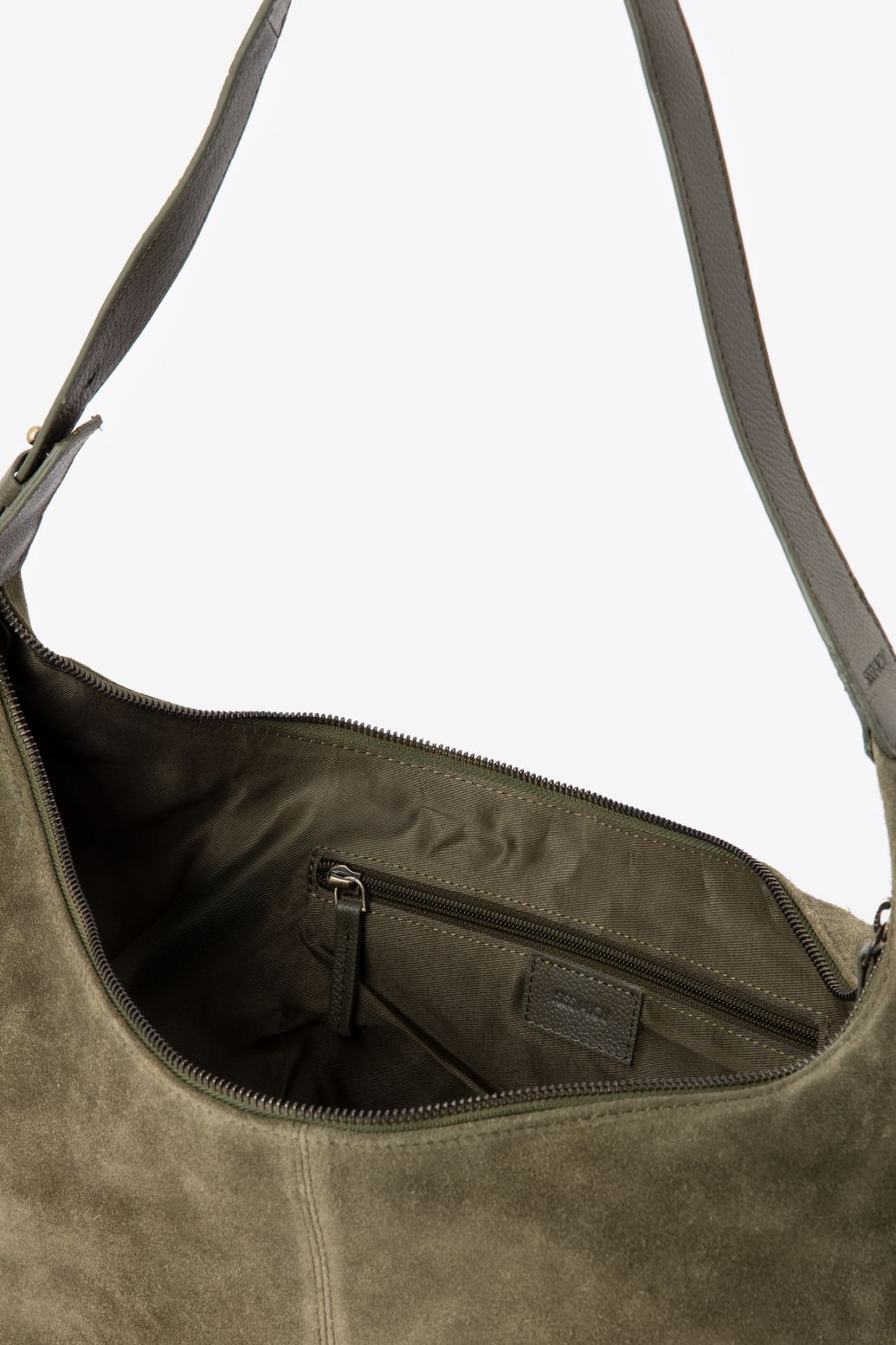 Donkergroene suède tas