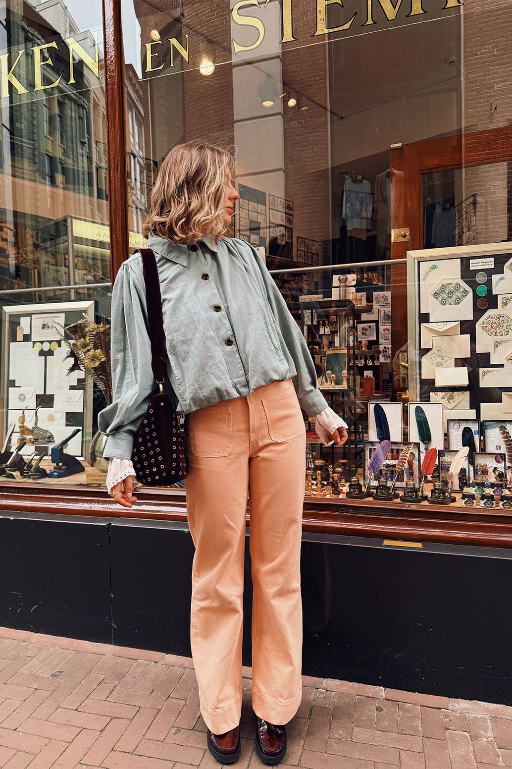 Lichtoranje high waist jeans met opgestikte zakken