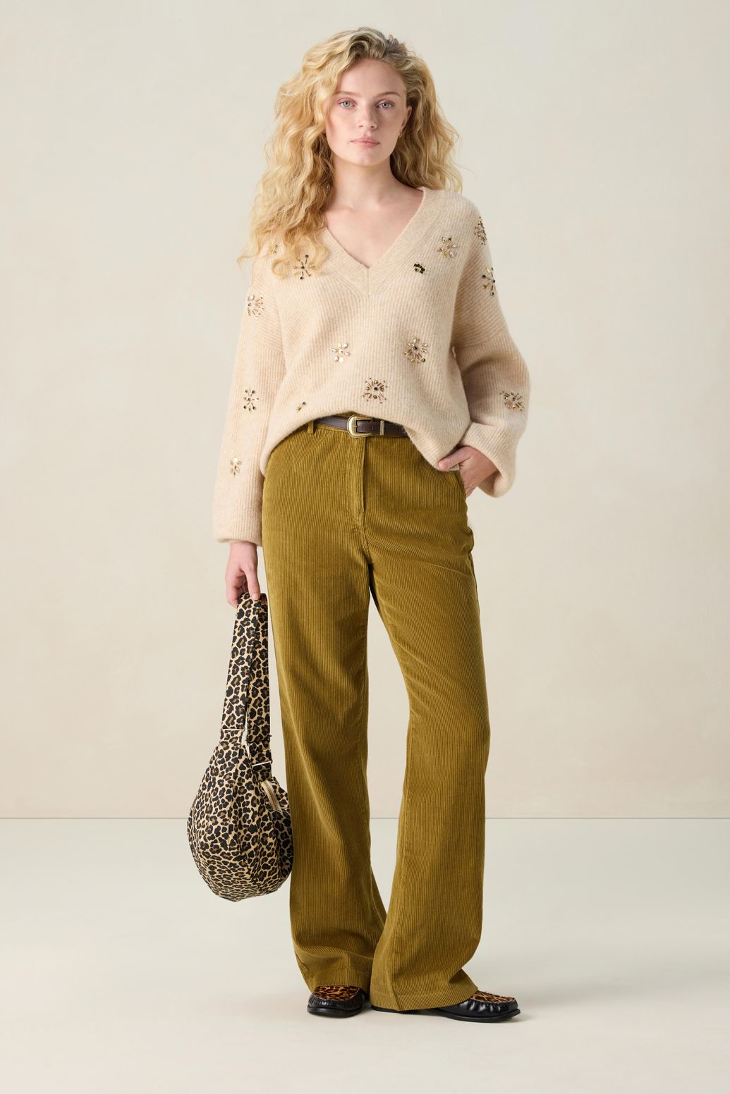 Beige trui met V-hals