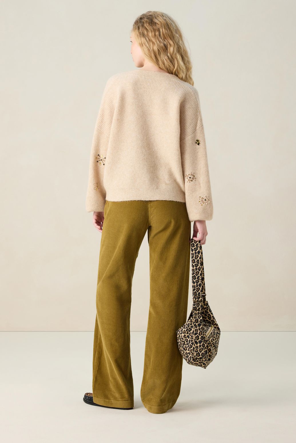 Beige trui met V-hals