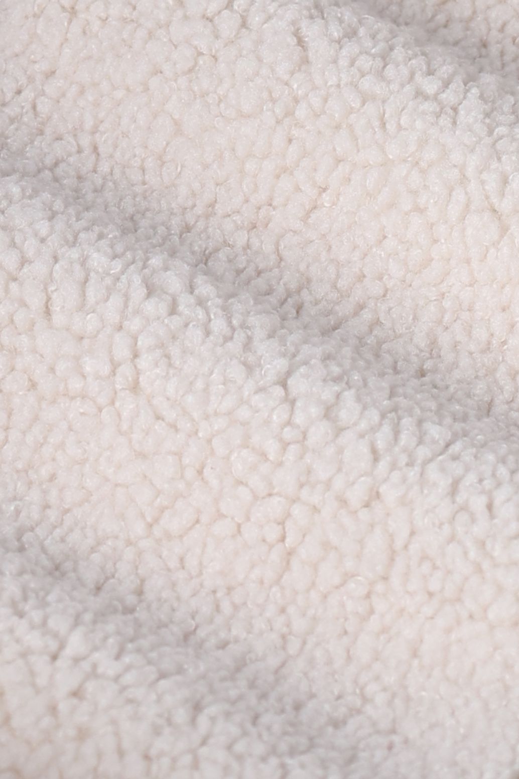 Witte teddy jas met smiley