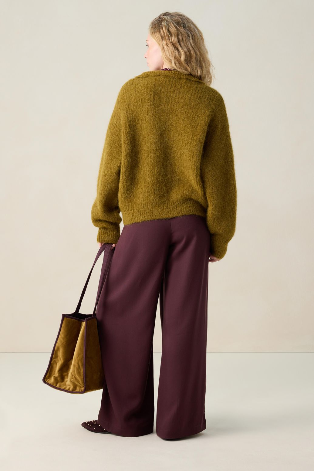 Donkergroene trui met rits