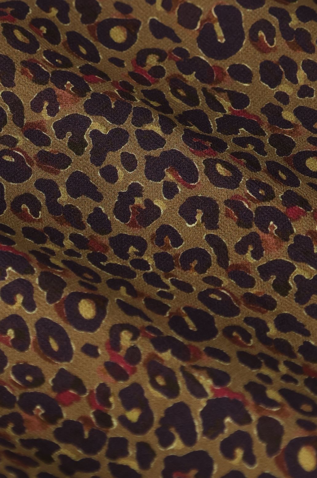 Donkergoene blouse met leopard print