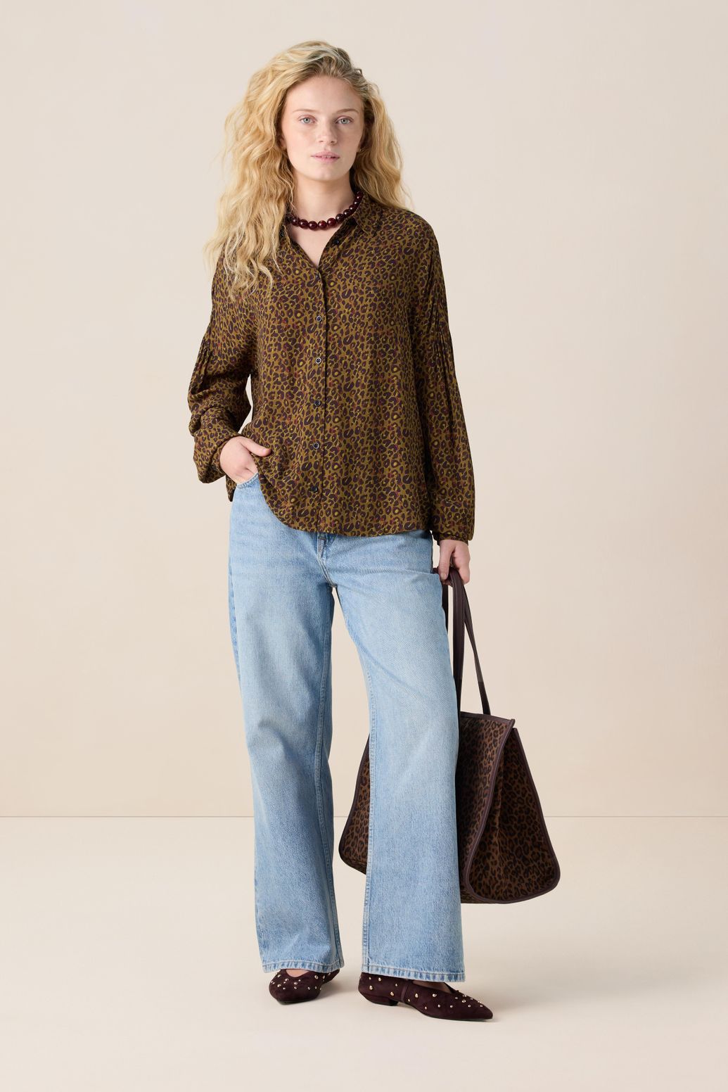Donkergoene blouse met leopard print