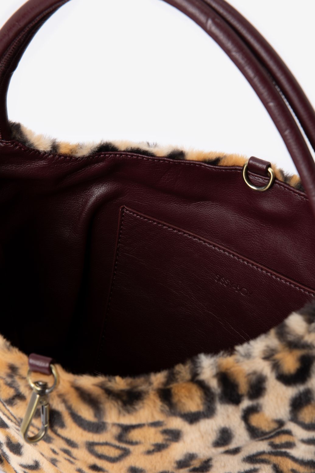Schultertasche mit Leoprint zum Wenden - braun