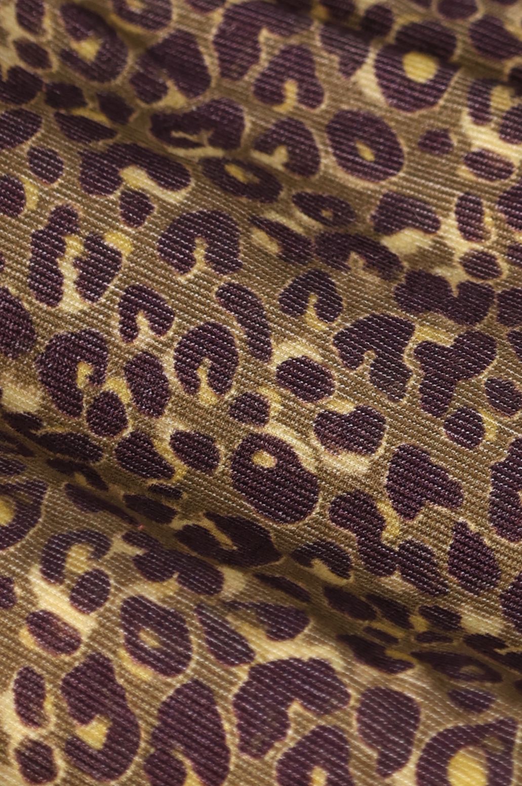 Donkergroene blouse met leopard print