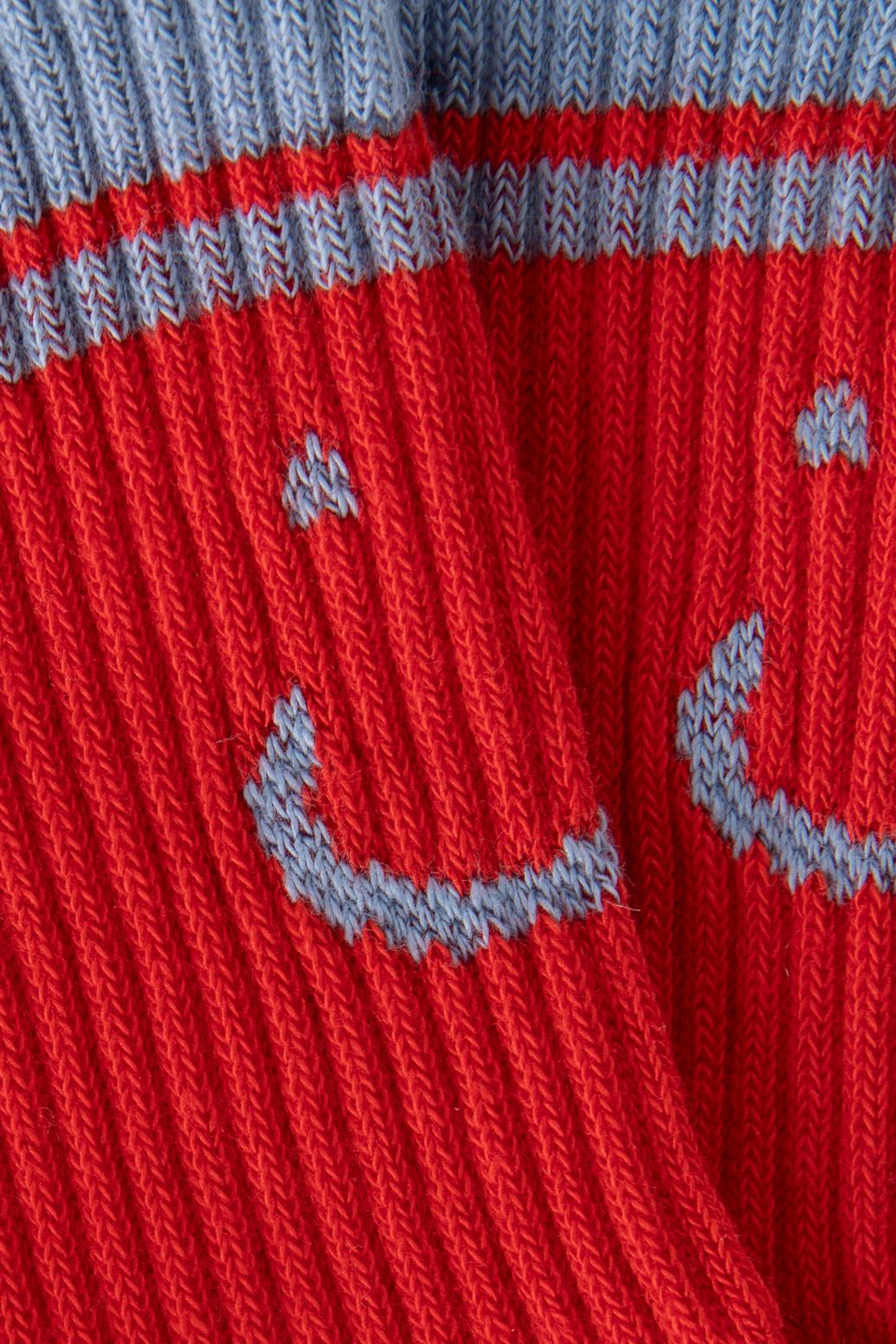 Rode sokken met smiley