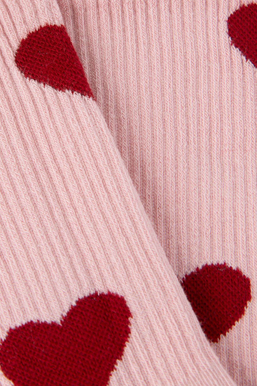 Lichtroze sokken met hartjes