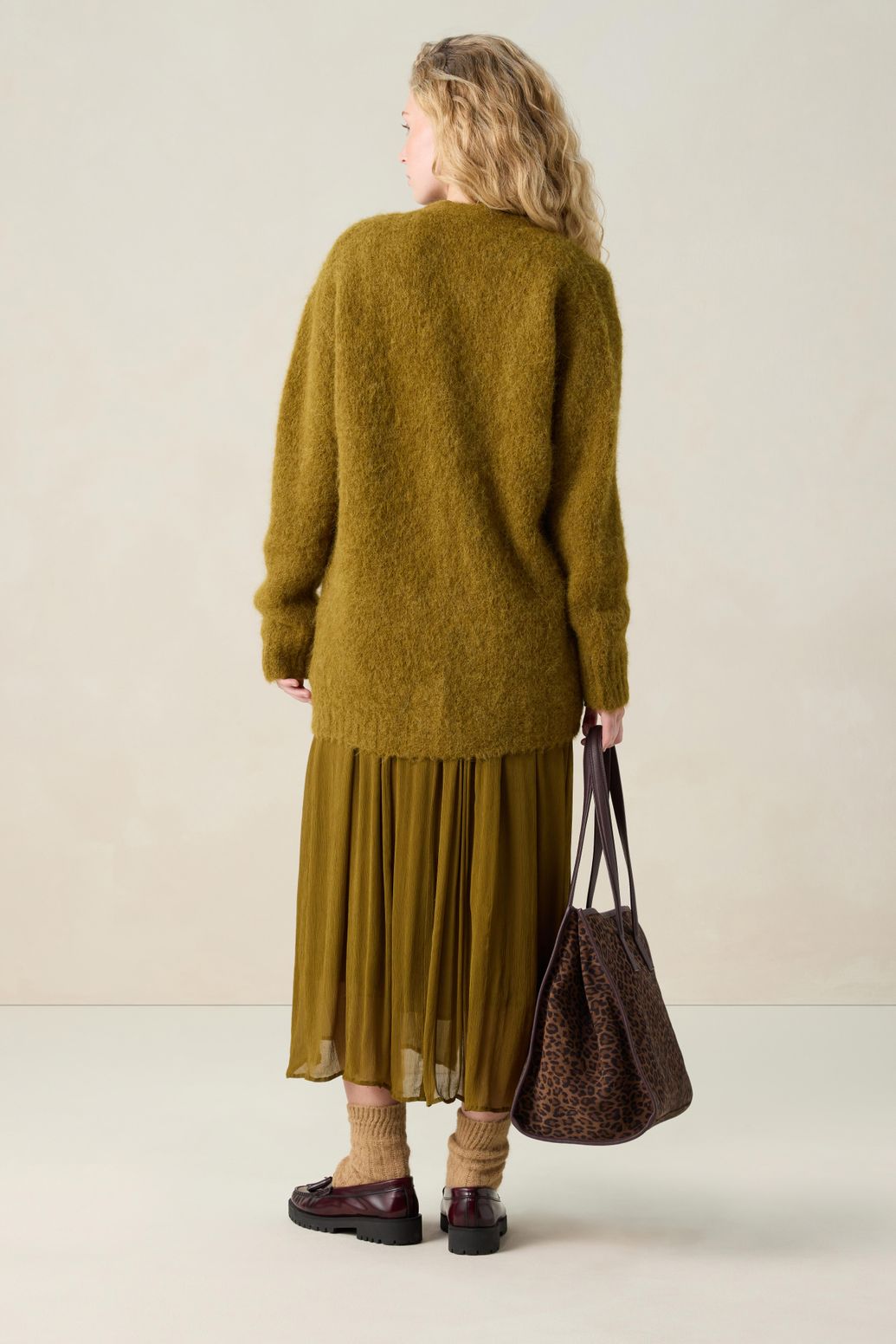 Donkergroen vest met V-hals