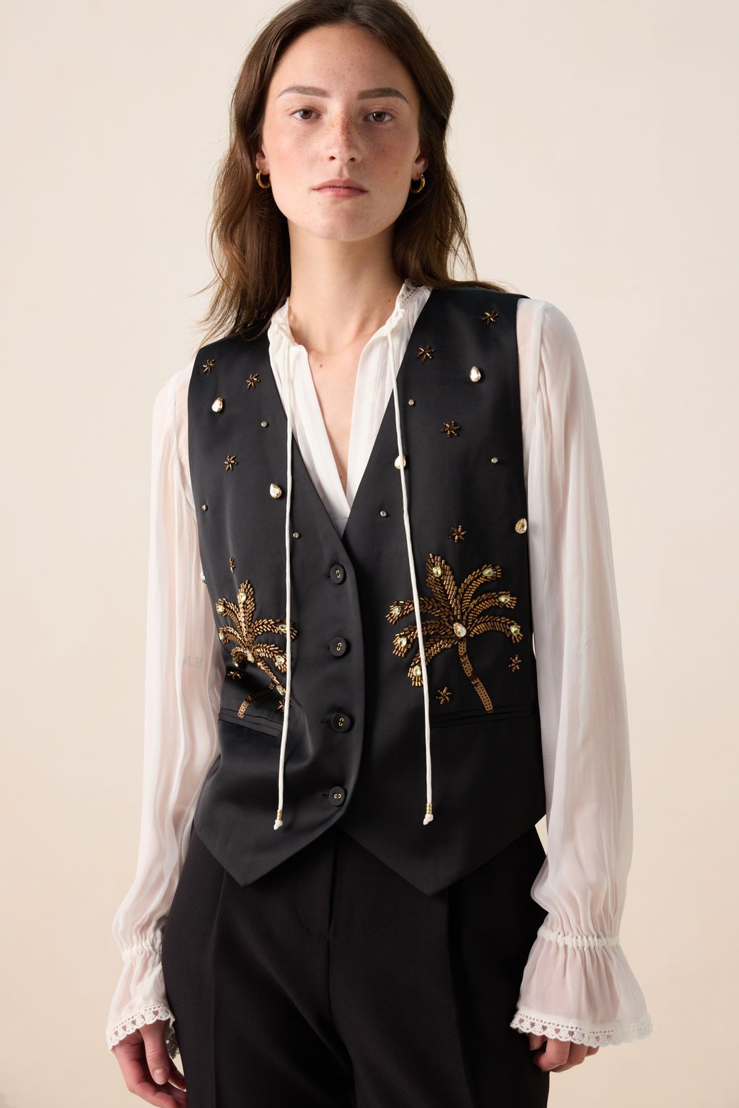 Zwart gilet met palmbomen