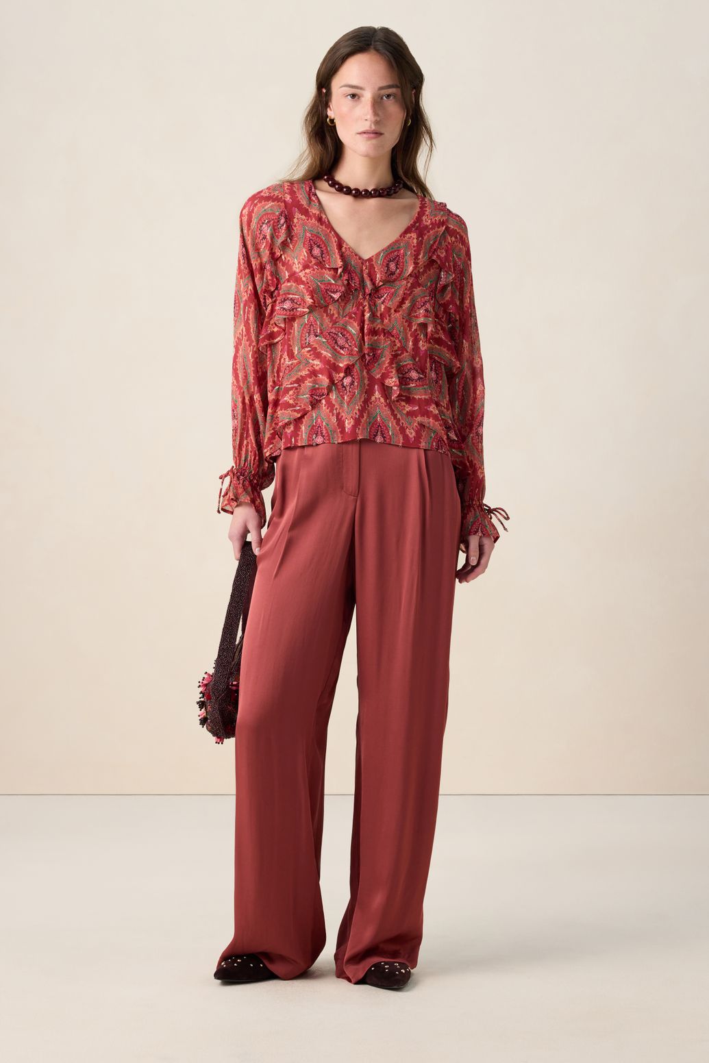 Rode ruffle blouse met print