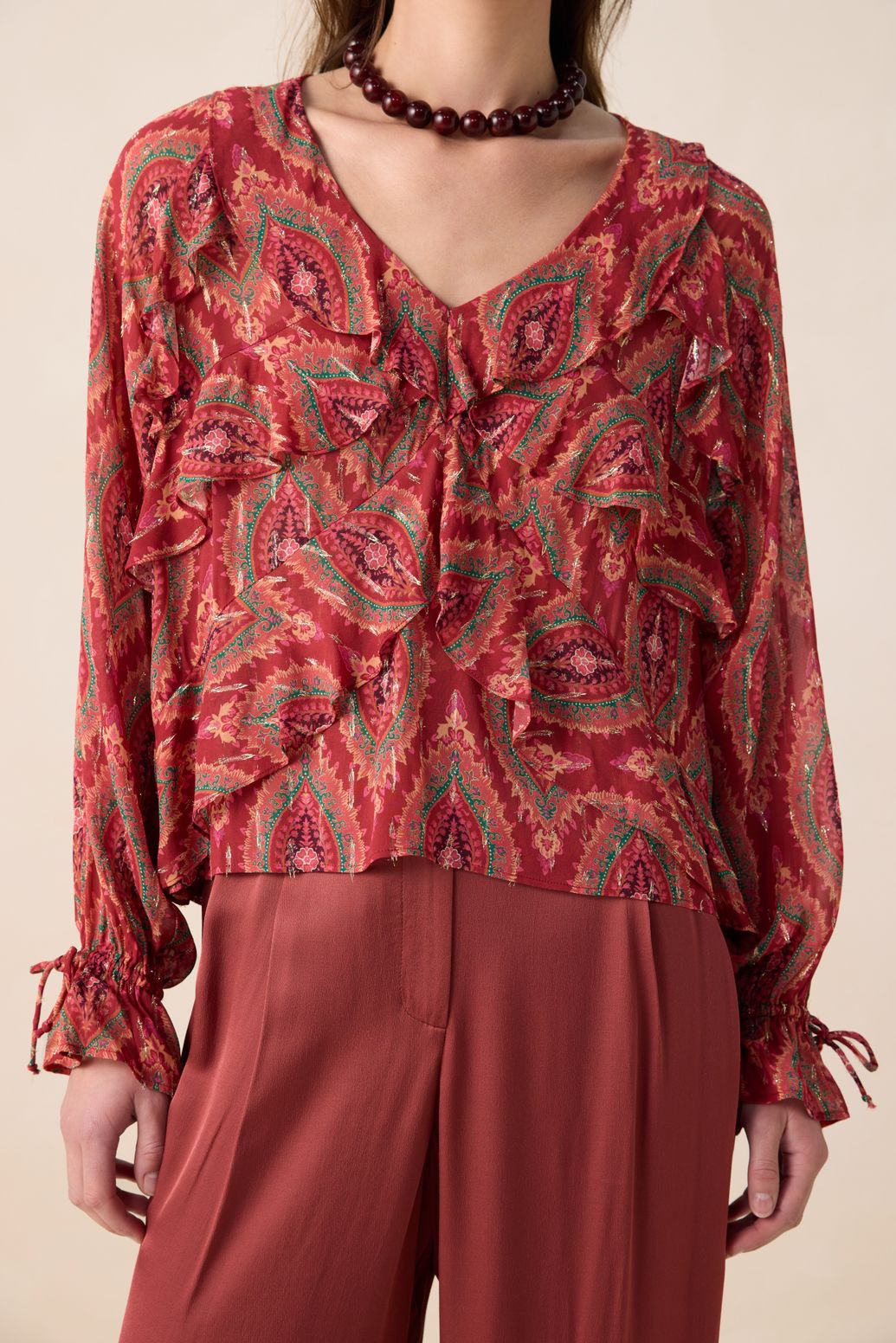 Rode ruffle blouse met print