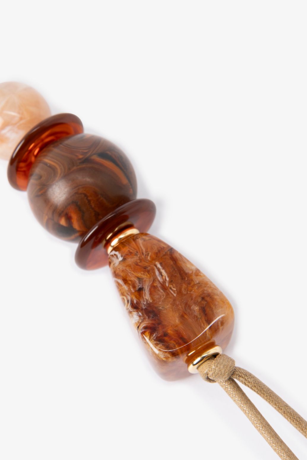 Bruine resin bag charm