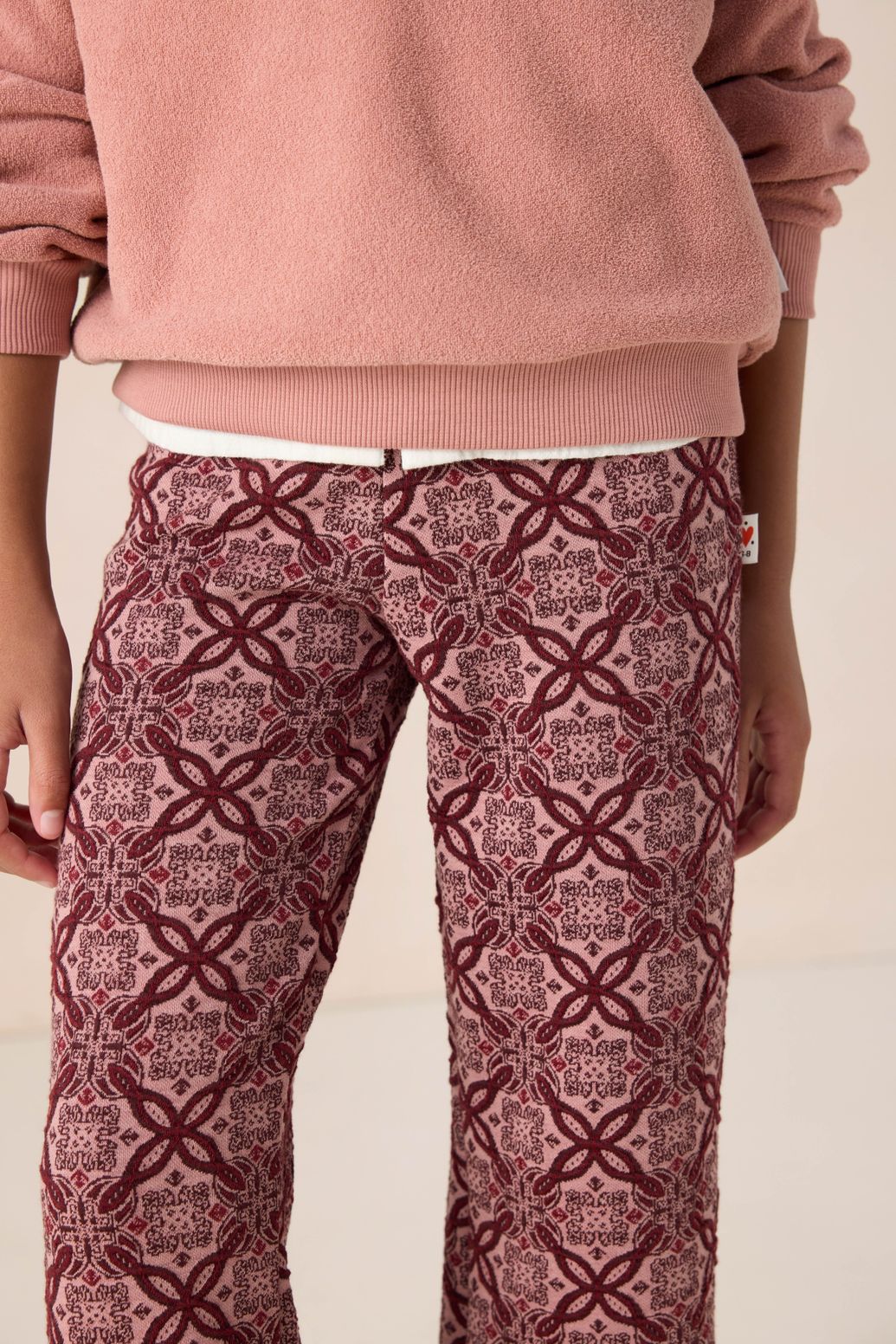 Donkerrode straight legging met print