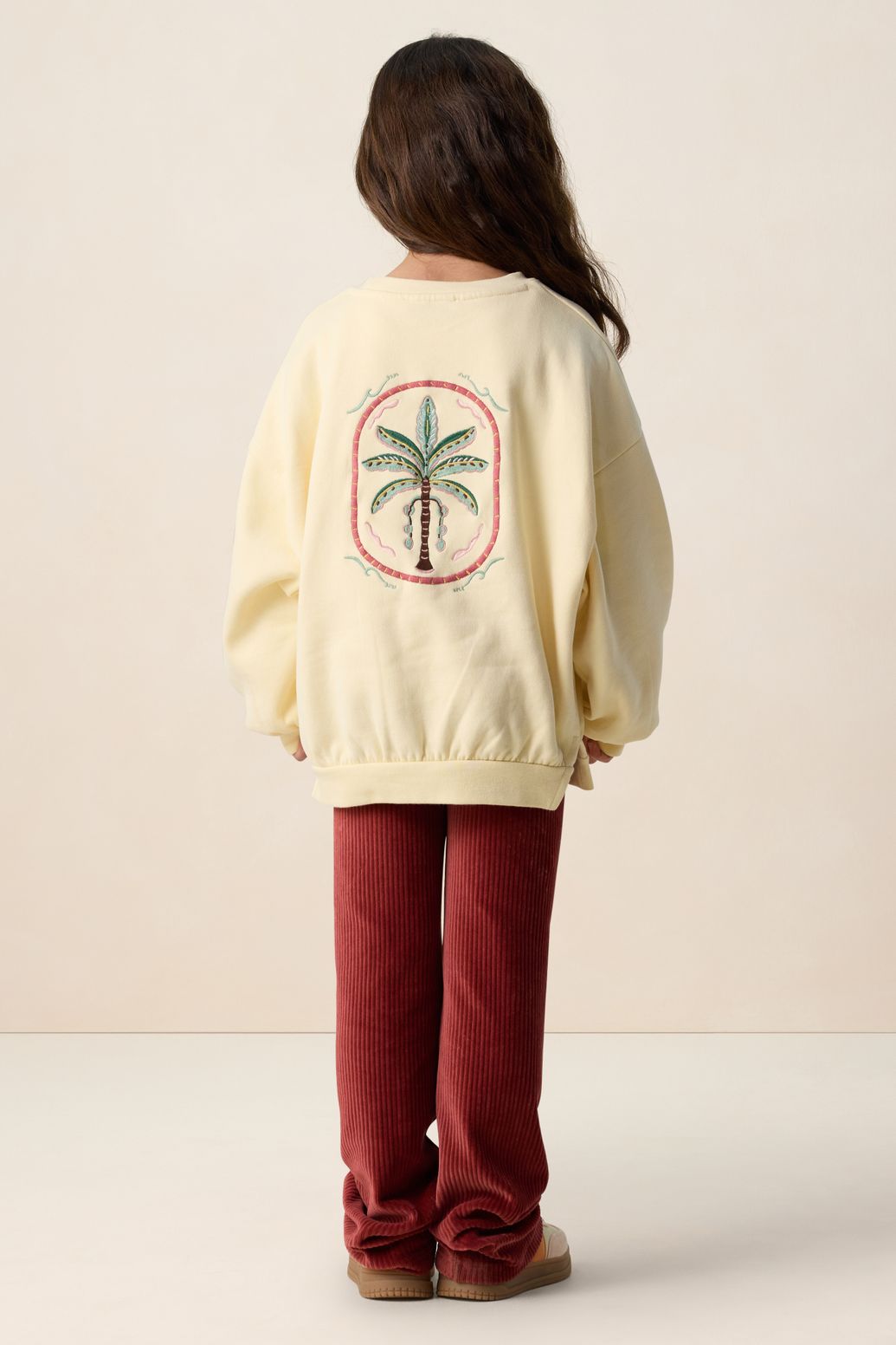 Lichtgele sweater met embroidery