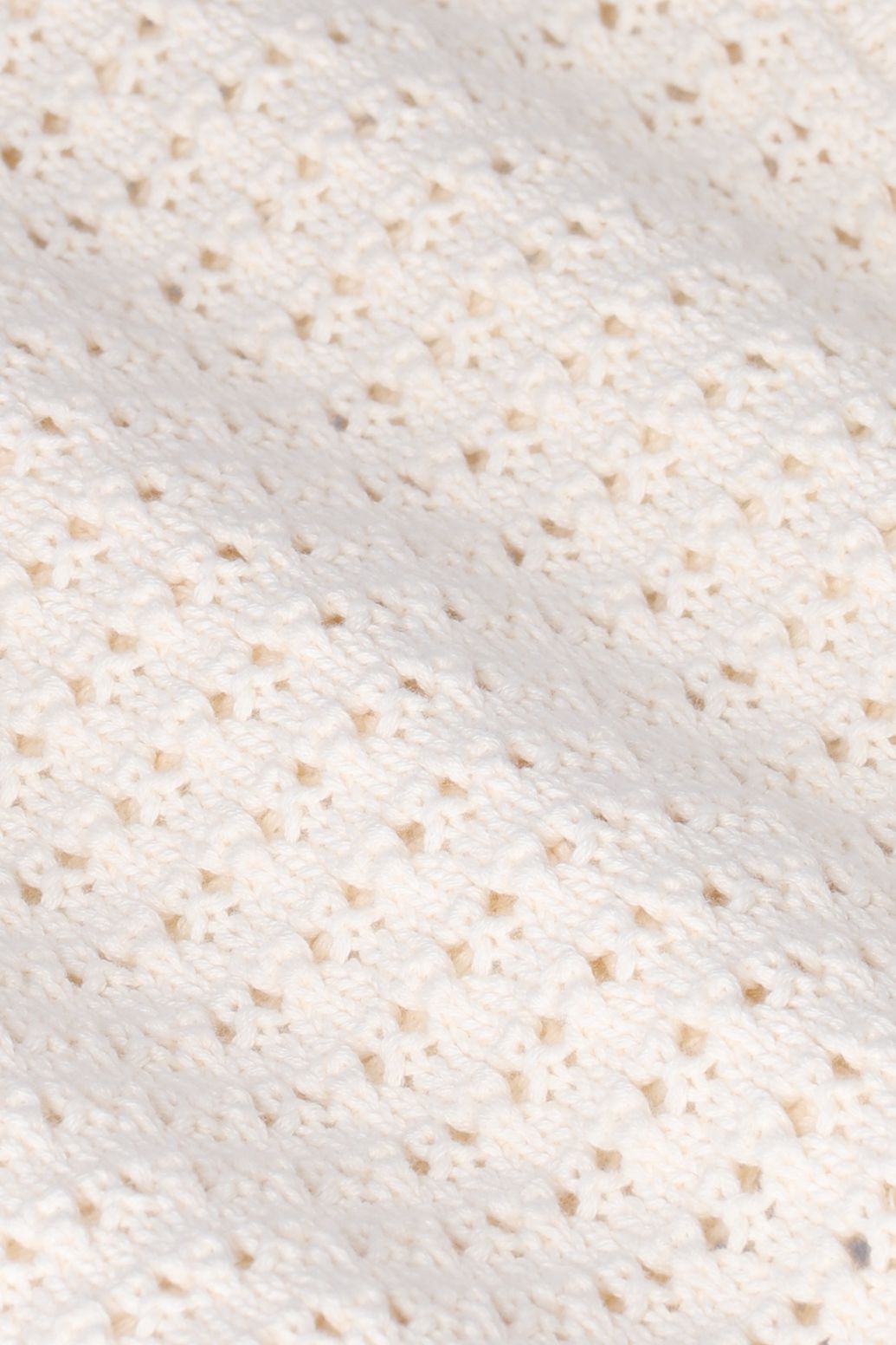 Witte opengewerkte spencer