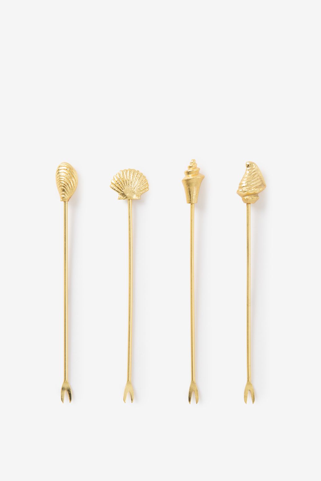 Goudkleurige prikkers met schelpen