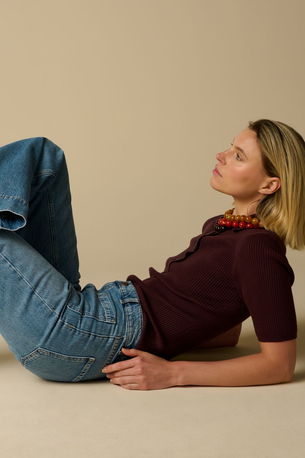 Donkerbruine gebreide polo