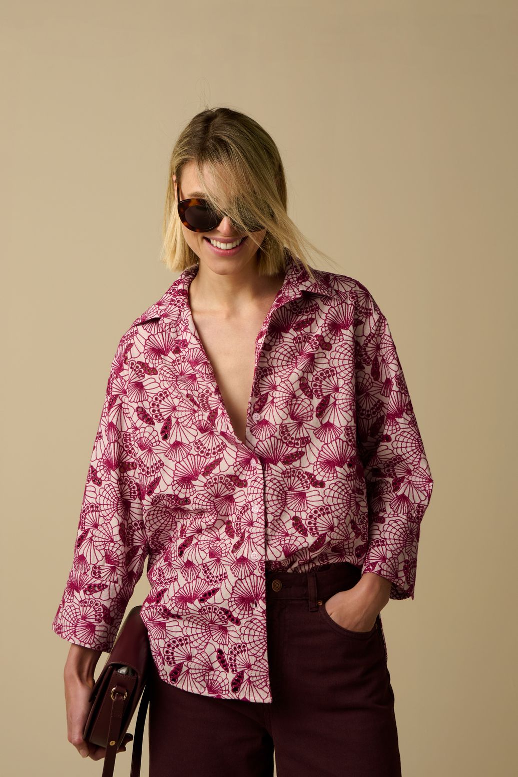 Lichtroze blouse met schelpen broderie