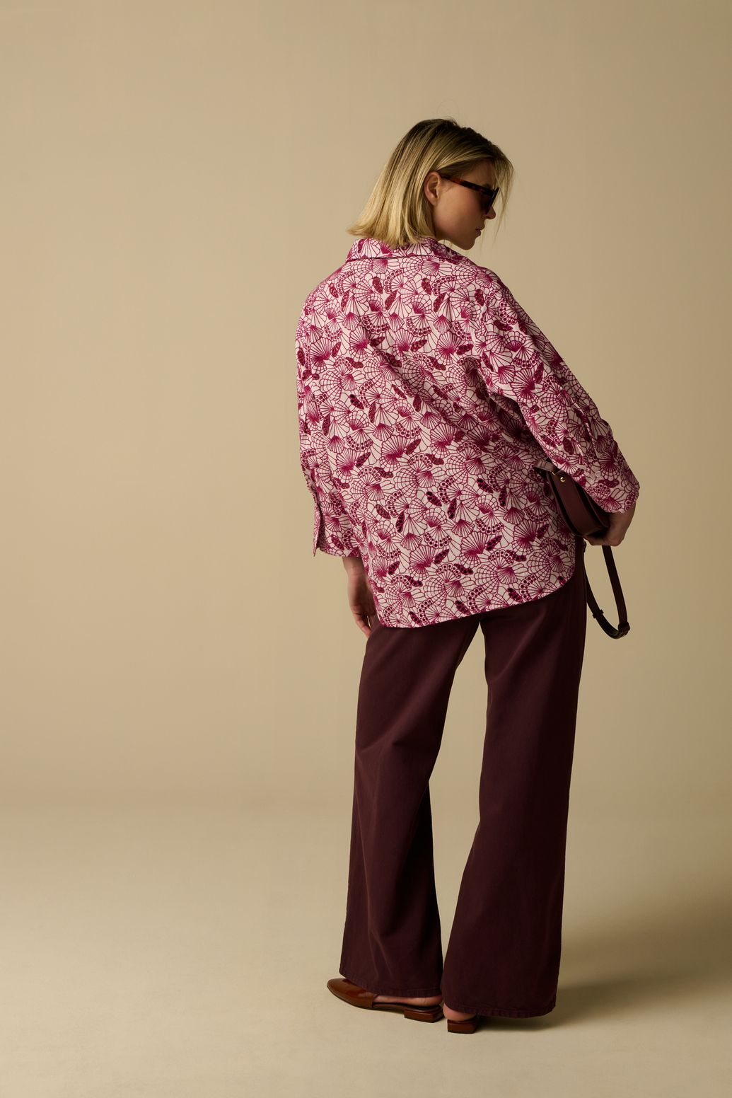 Lichtroze blouse met schelpen broderie