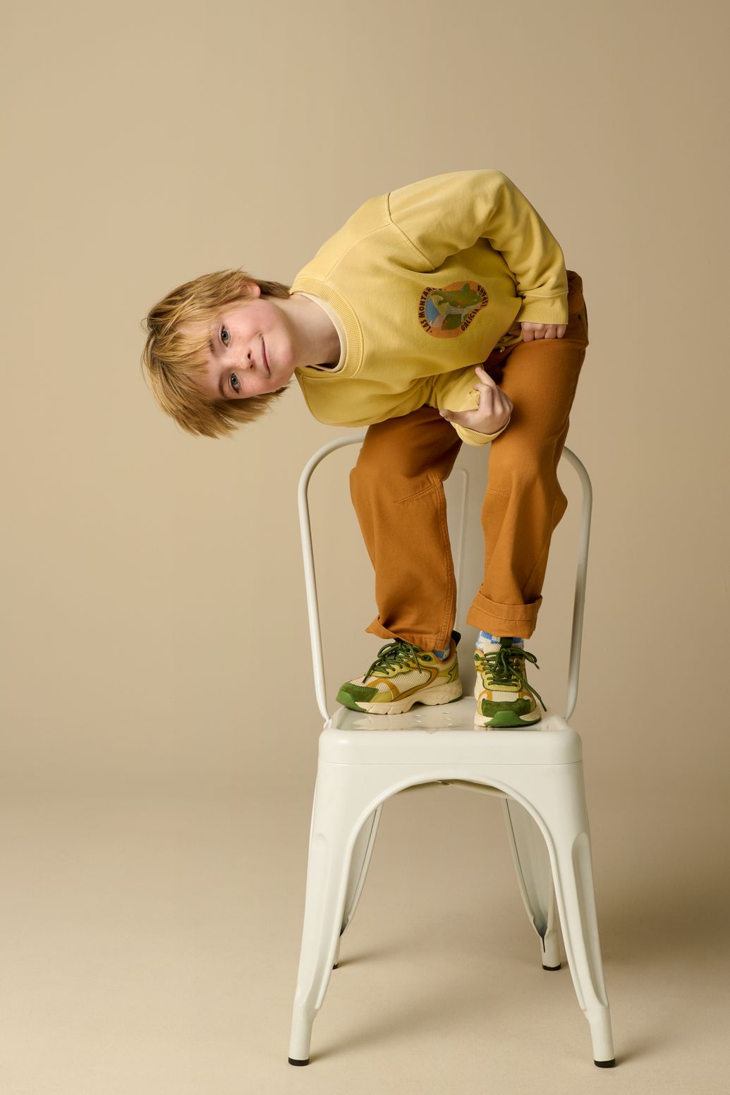 Gele sweater met artwork